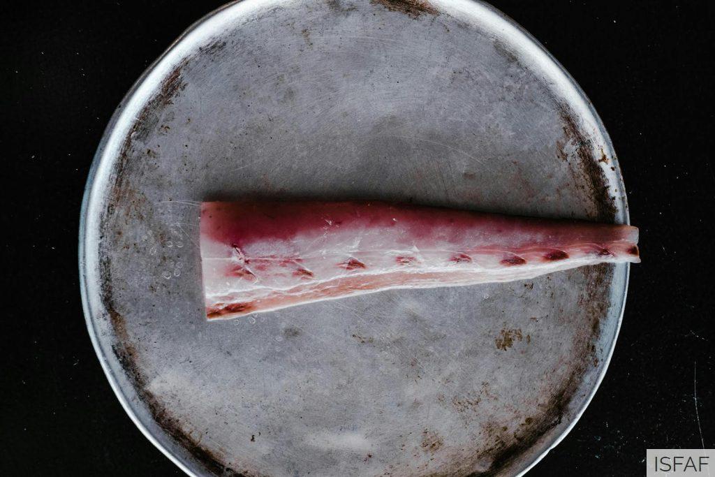 Raw Fish Meat on Round Steel Plate